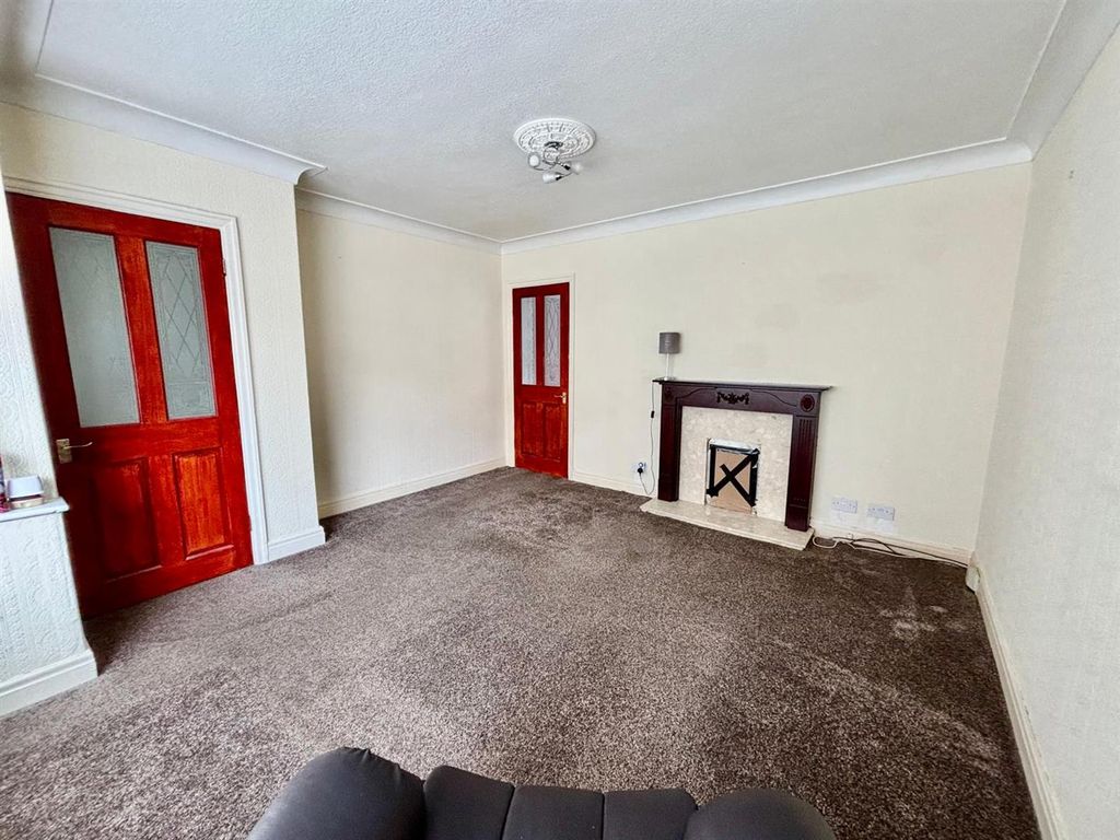 Property photo 2 of 12 Living Room: