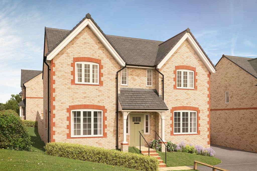 Property photo 1 of 10 A Light-Colored Brick House With Red Brick Accents And A Gray Roof Stands On A Green Lawn In The For