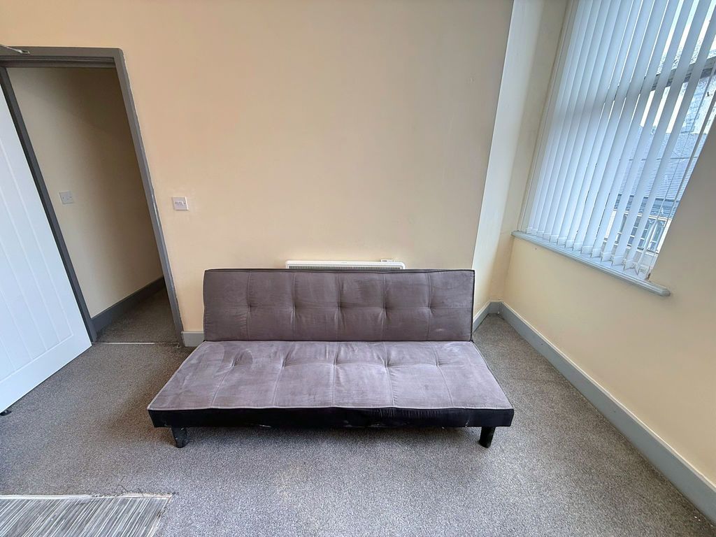 Property photo 2 of 6 Living Area