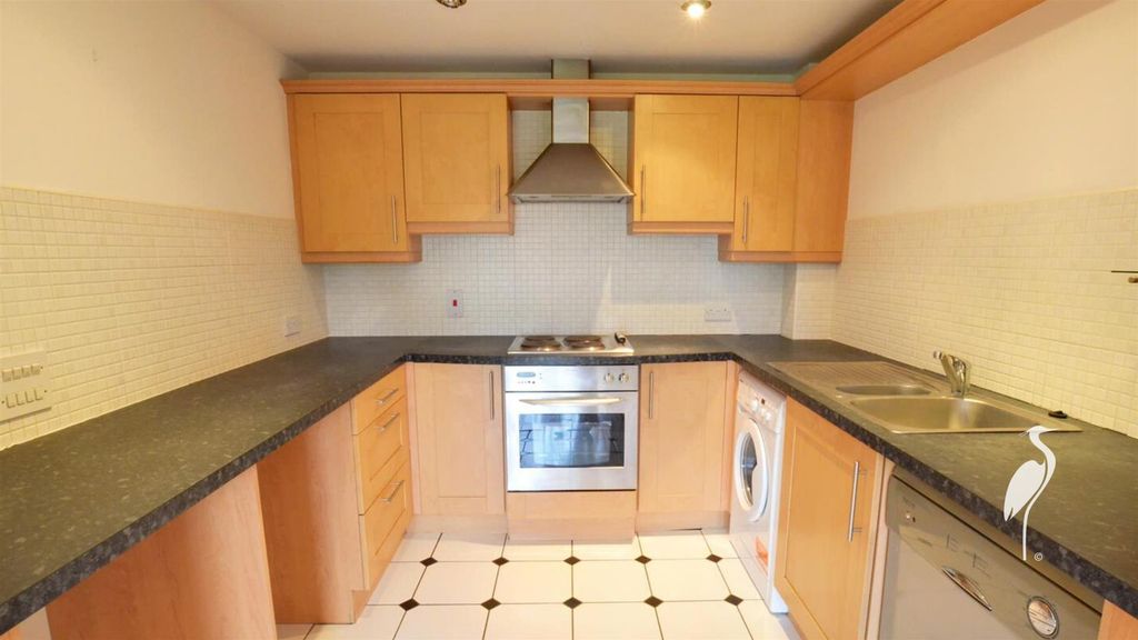 Property photo 3 of 8 Kitchen