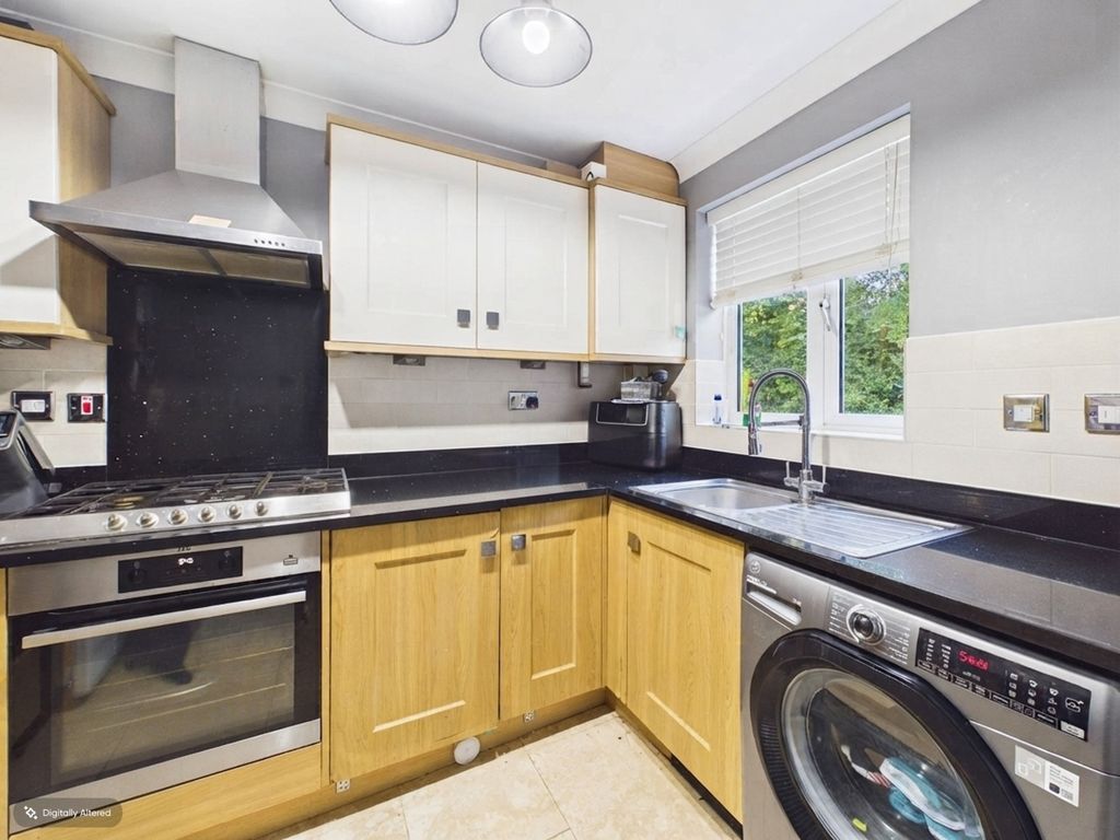 Property photo 3 of 13 Kitchen