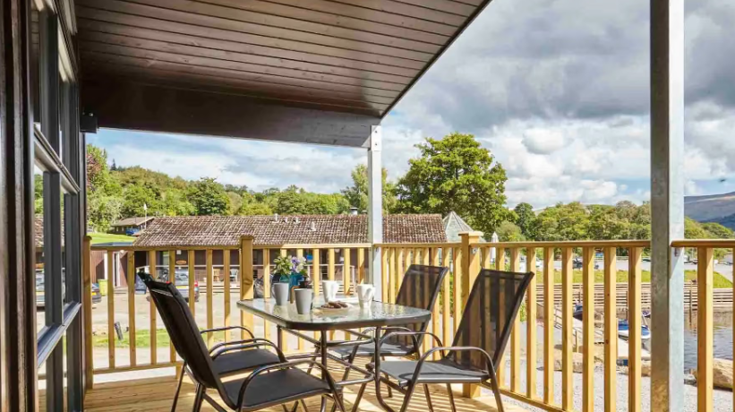 Property photo 2 of 10 Covered Decking With Outdoor Dining And Views Towards Loch Tay