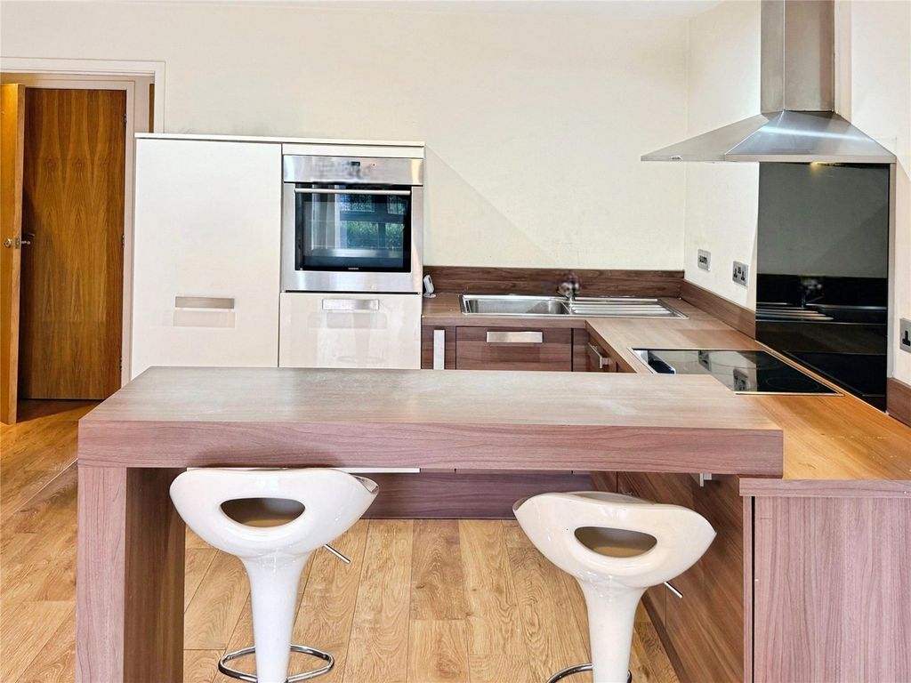 Property photo 2 of 11 Kitchen Area