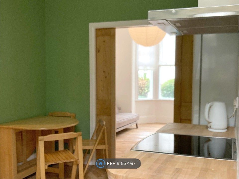 Property photo 3 of 12 Kitchen Through To Living Room
