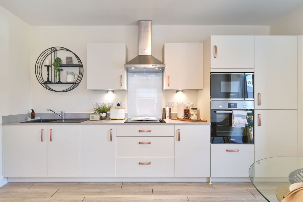 Property photo 3 of 11 Typical Kitchen
