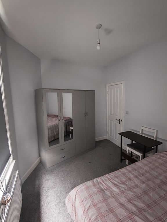 Property photo 1 of 5 Bright Bedroom With Ample Storage And Desk Space...