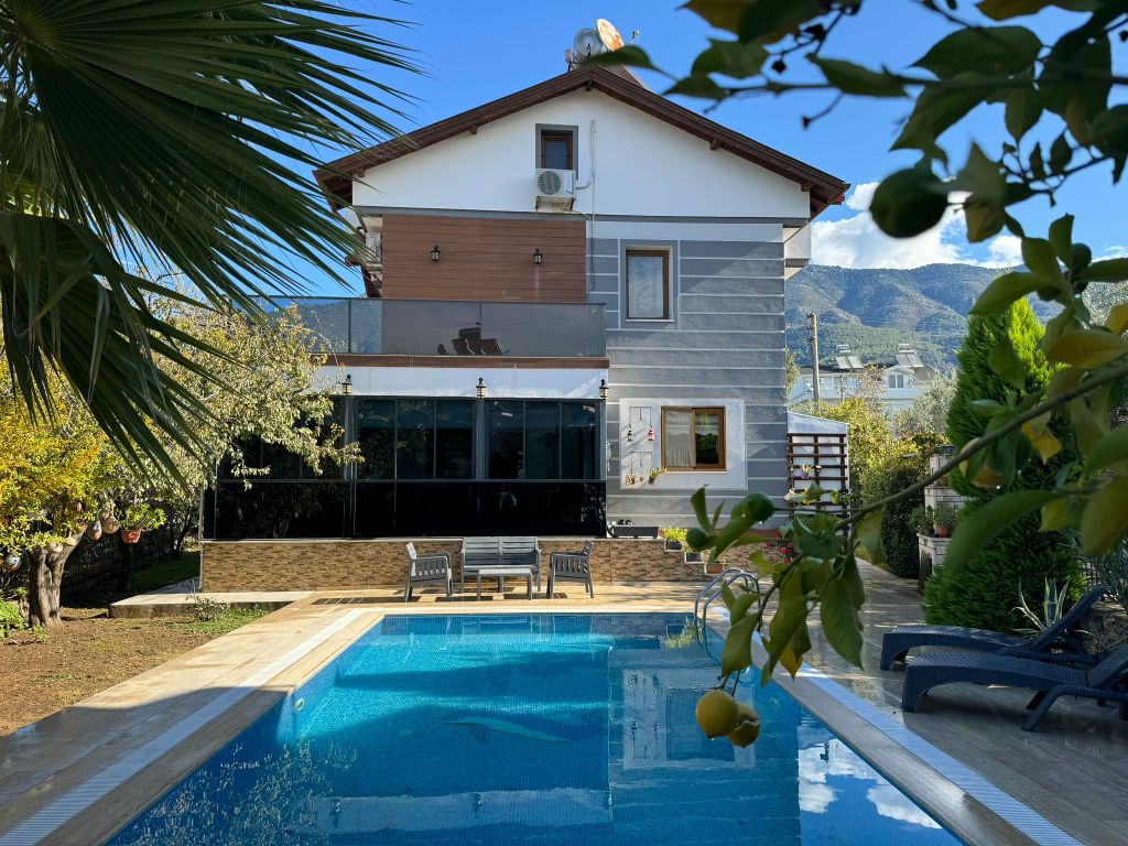 Property photo 1 of 26 An Attractive Fethiye Property For Sale - Main View Of The Villa And Private Pool