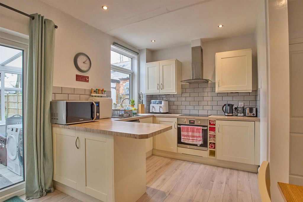 Property photo 2 of 12 Kitchen Area
