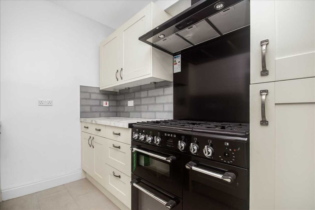 Property photo 3 of 13 Kitchen