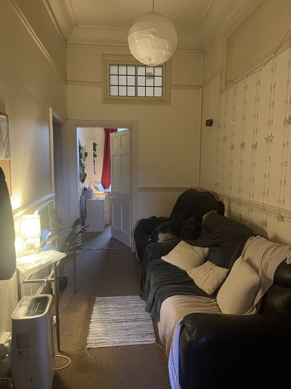 Property photo 3 of 4 Cozy Furnished Living Room With A Comfy Leather So...