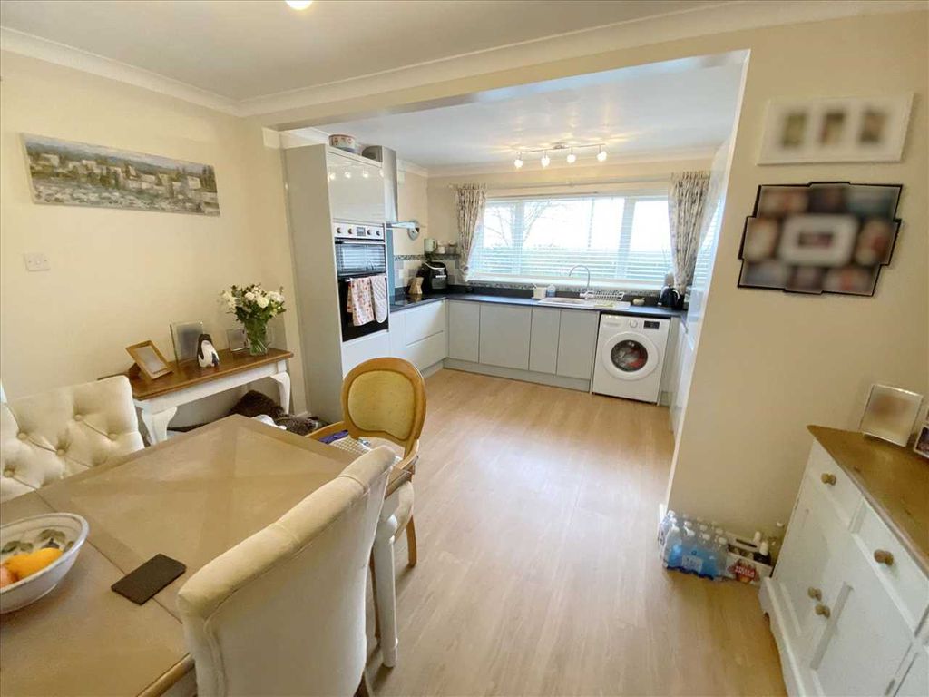 Property photo 2 of 11 Dining Kitchen:
