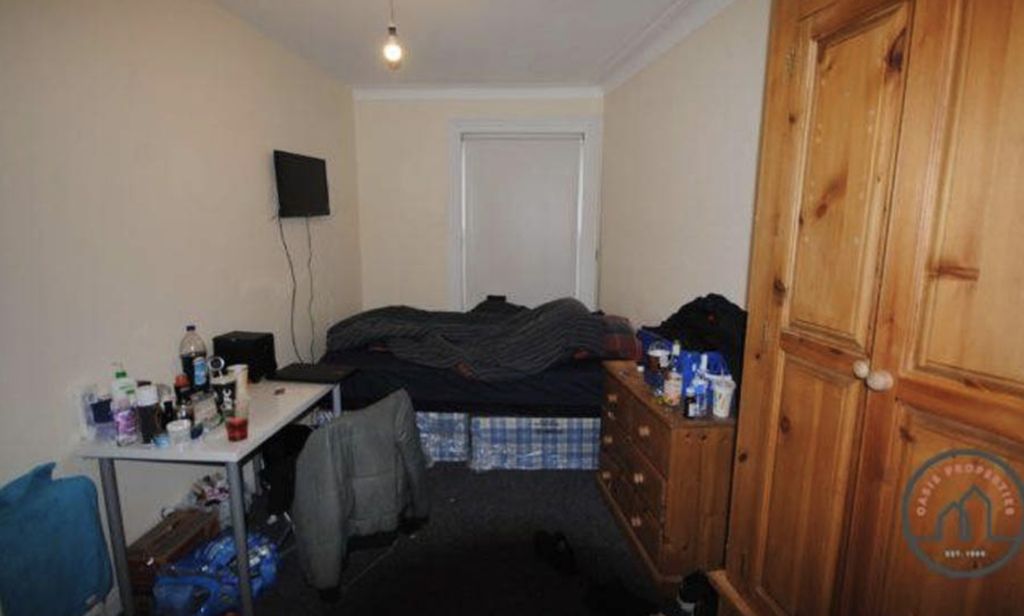 Property photo 3 of 3 A Modest Single Bedroom Featuring A Bed With A Che...