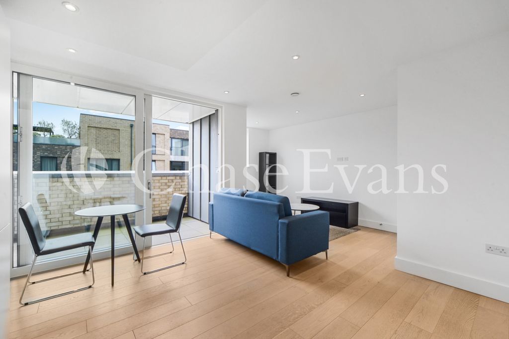 Property photo 3 of 13 Living Area