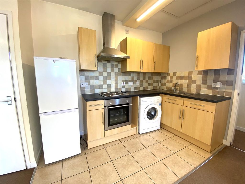 Property photo 3 of 6 Kitchen Area