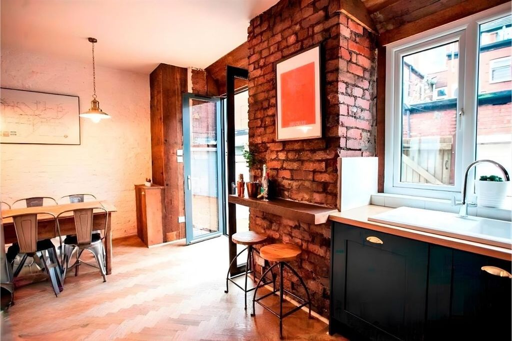 Property photo 3 of 12 Stylish Open-Plan Kitchen With Exposed Brick...