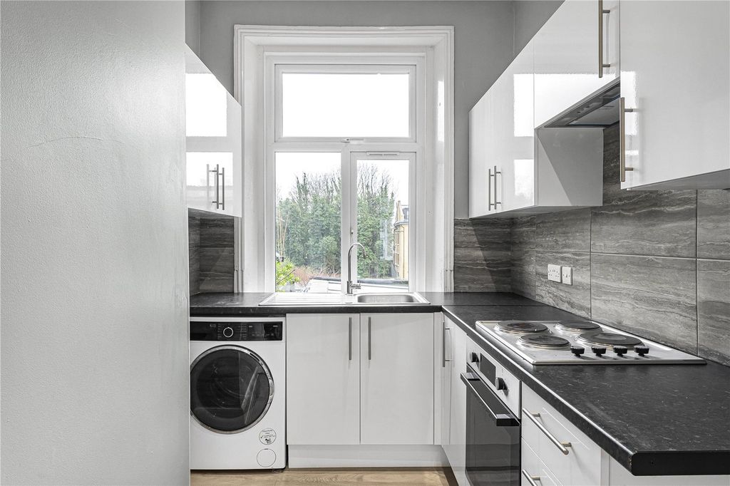 Property photo 2 of 12 Kitchen