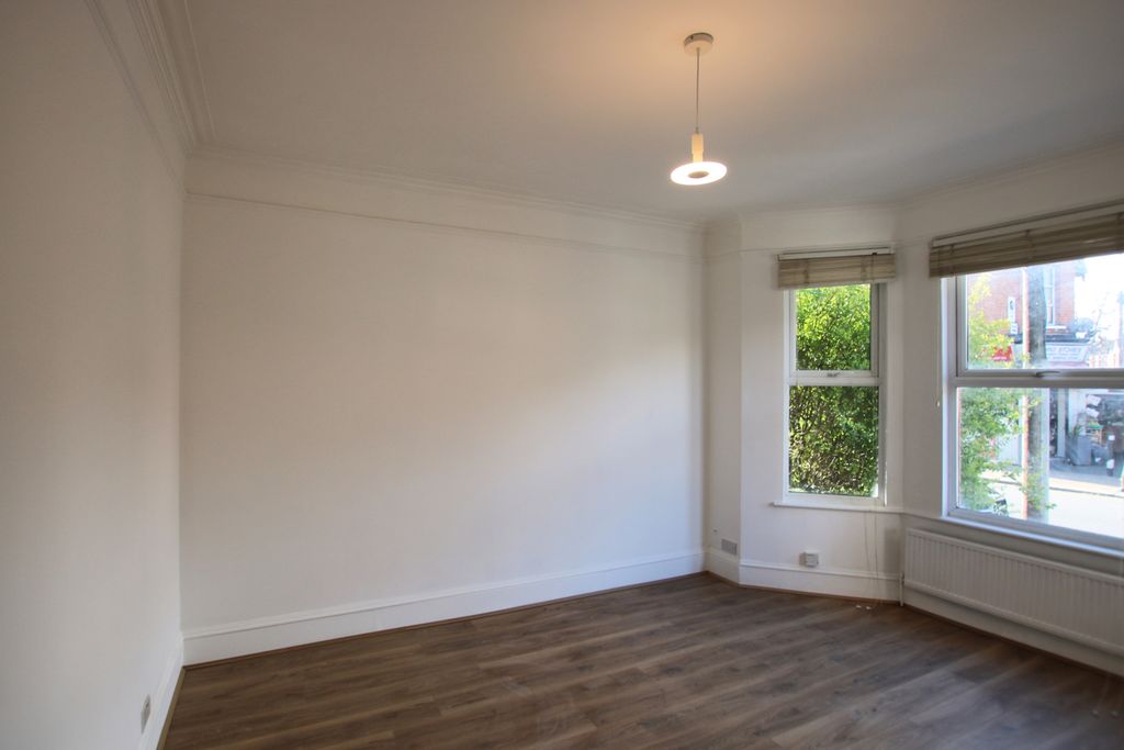 Property photo 3 of 13 Living Room 1