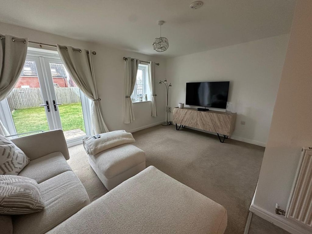 Property photo 3 of 12 Living Room