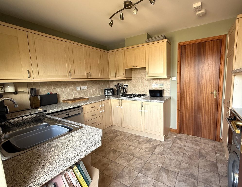 Property photo 3 of 13 Kitchen