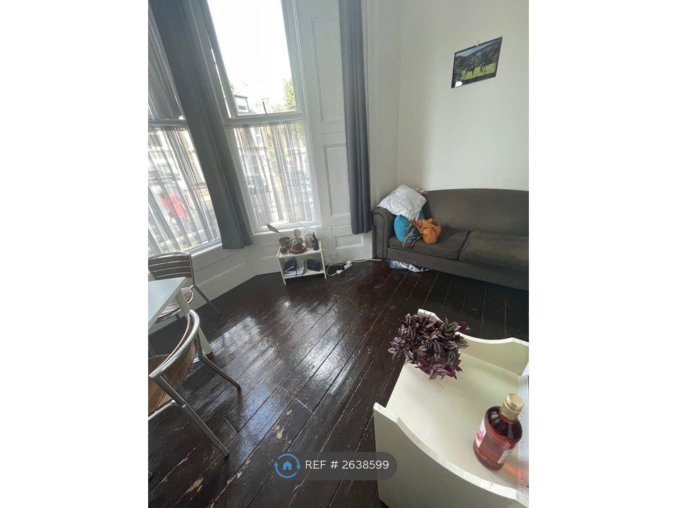 Property photo 1 of 12 Living Area