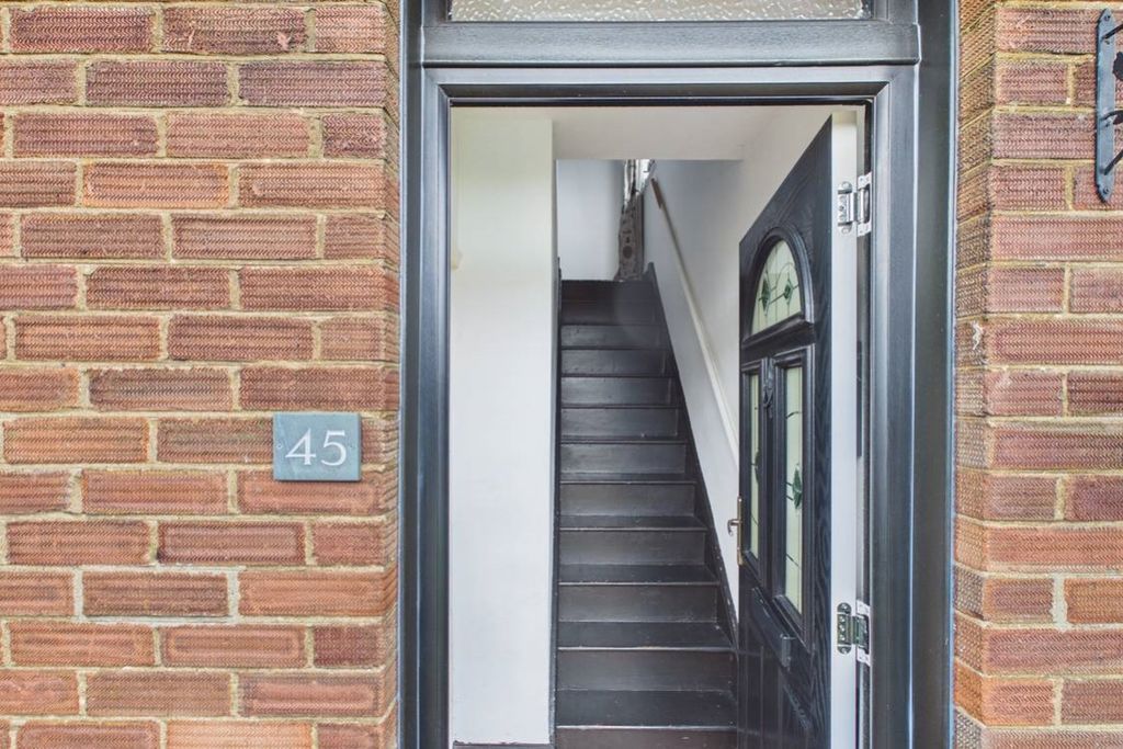 Property photo 2 of 22 Wooden Stairs And A Tiled Floor In The Entrance Ha