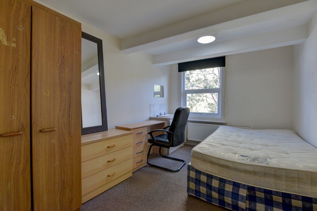 Property photo 3 of 14 A Cozy Student Bedroom Featuring A Comfortable Bed...