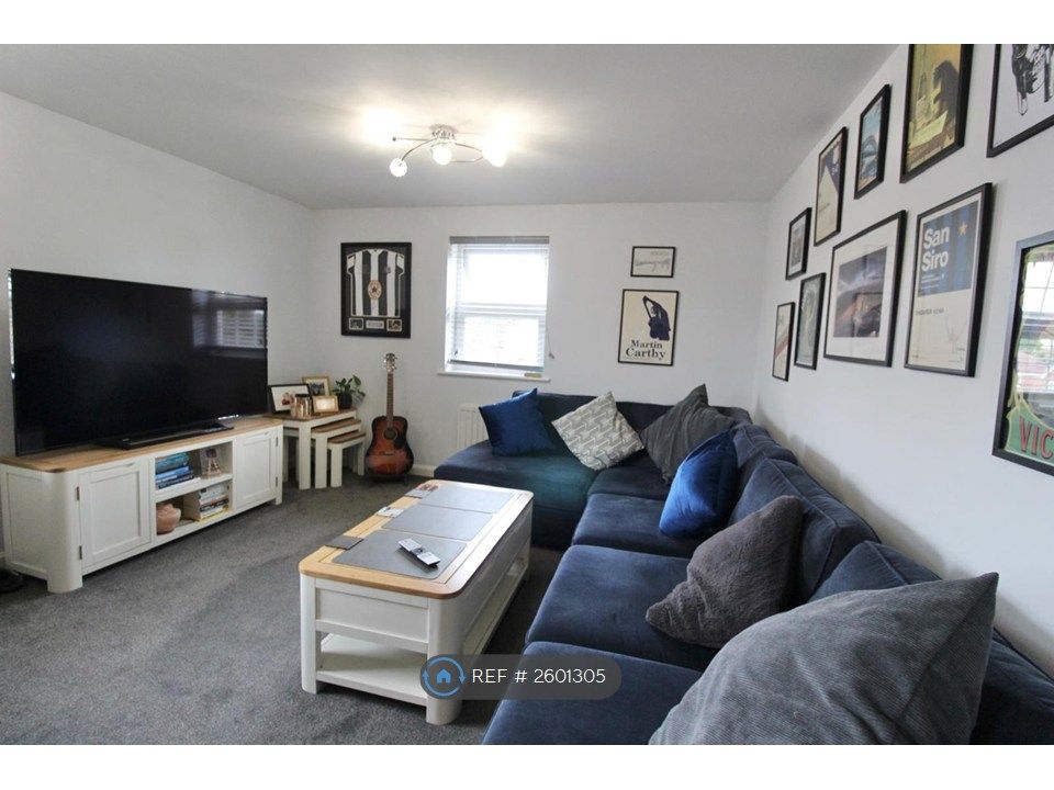 Property photo 2 of 16 Living Area