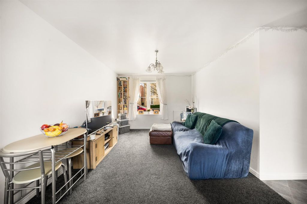 Property photo 3 of 12 Living Area