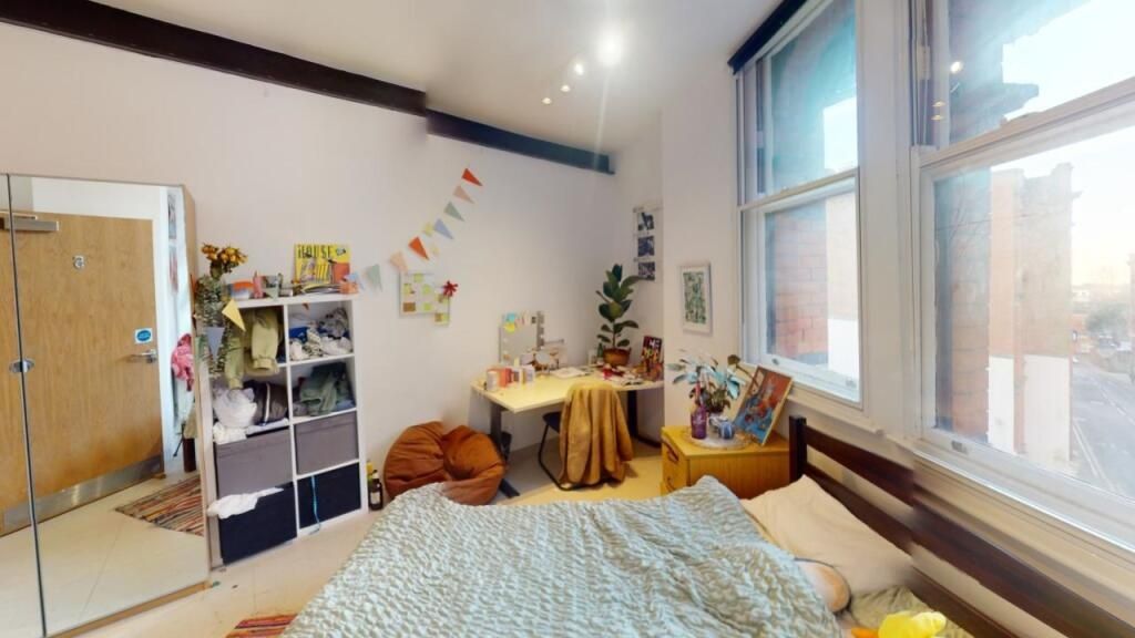 Property photo 1 of 15 Bright And Spacious Master Bedroom With Large Wind...