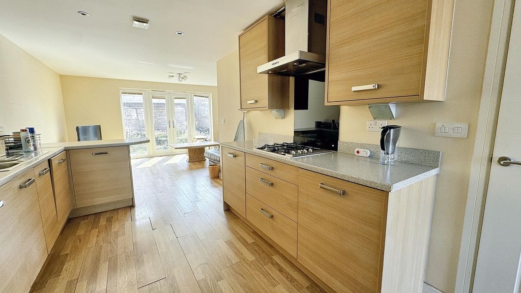 Property photo 2 of 9 Bright Modern Kitchen With Light Wood Cabinetry, i...