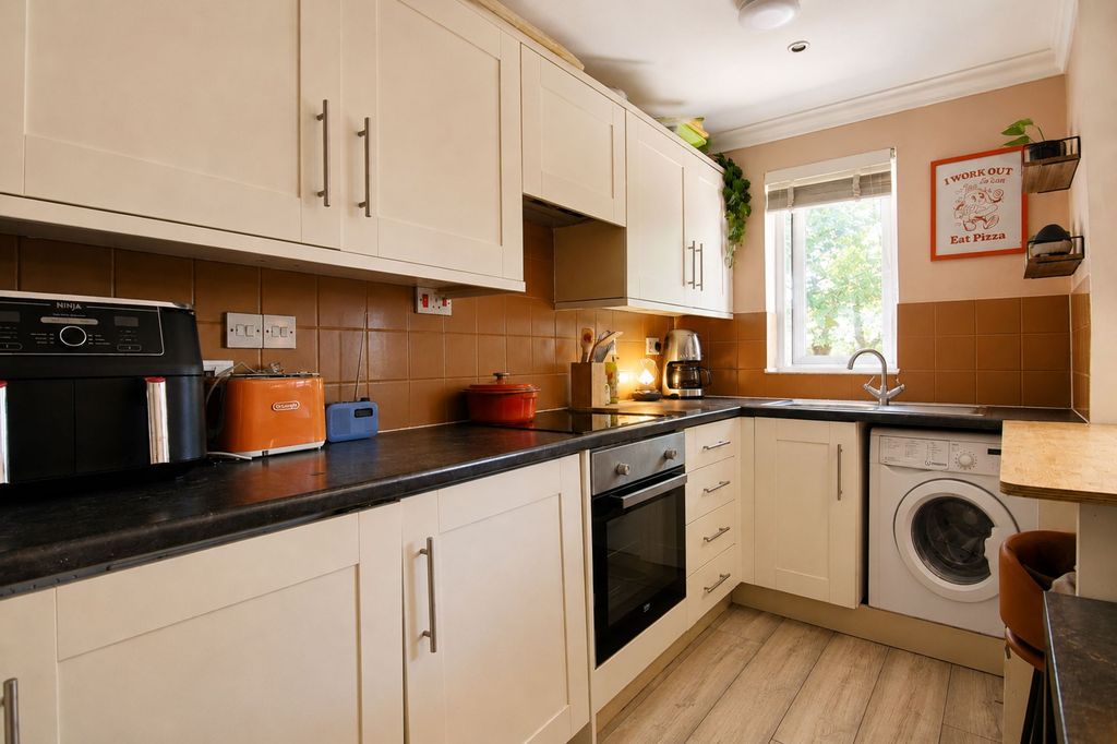Property photo 2 of 10 Kitchen Area