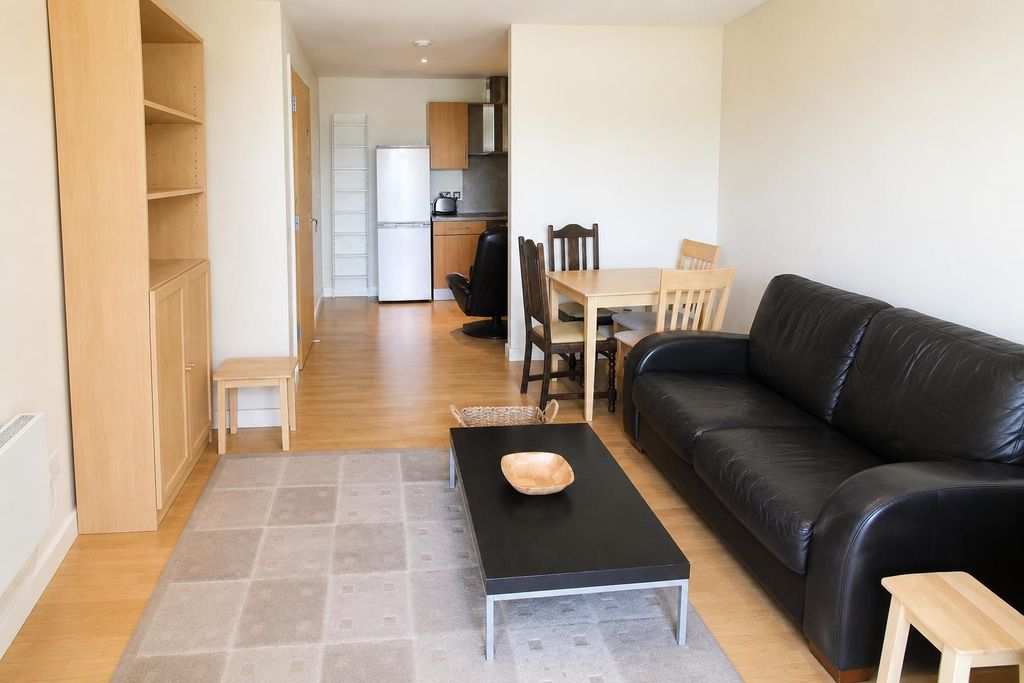 Property photo 3 of 7 Bright Open-Plan Lounge With Dining Area...