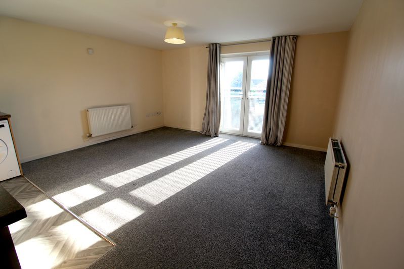 Property photo 3 of 9 Living Room Area