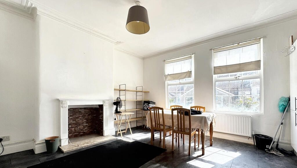 Property photo 1 of 9 Bright And Airy Living Room With Large Windows And...