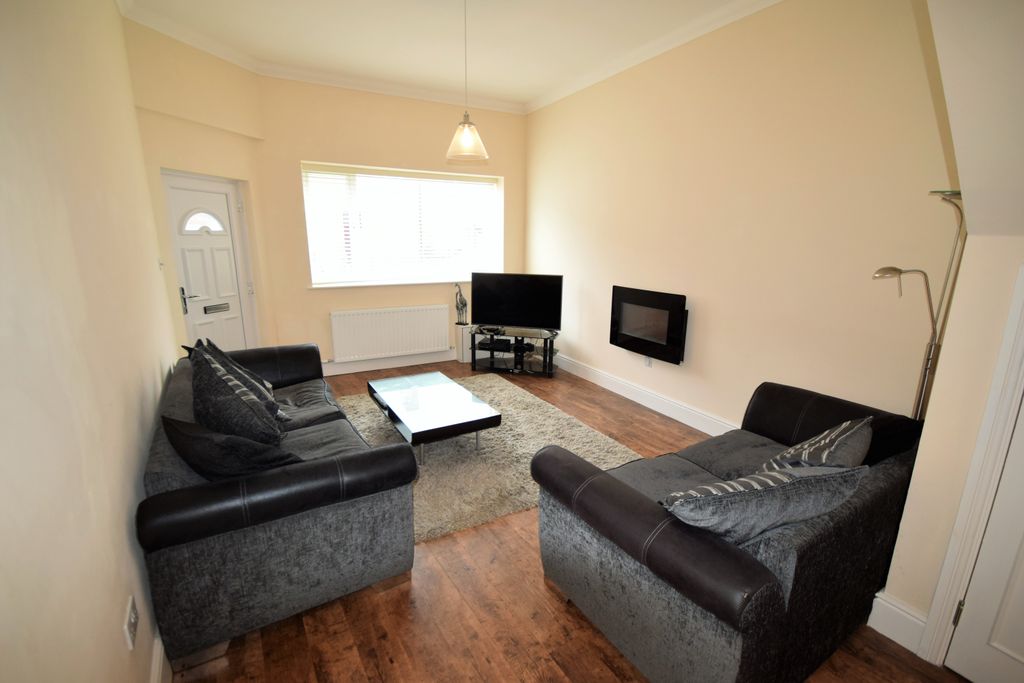 Property photo 2 of 12 Living Room