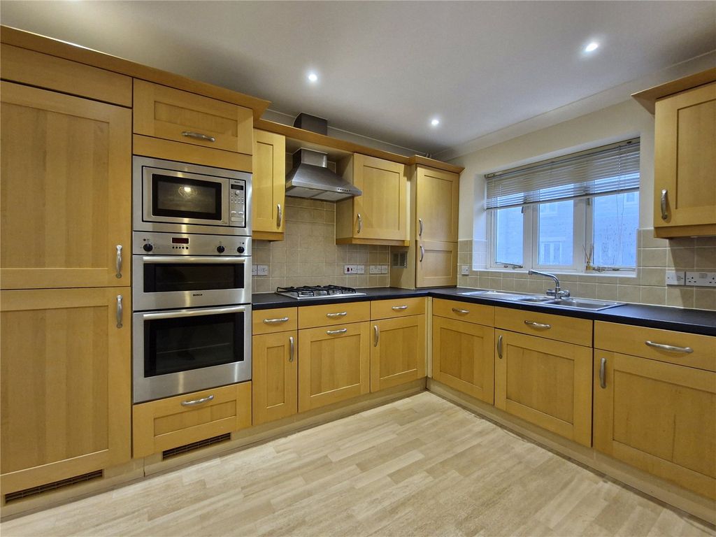 Property photo 3 of 12 Kitchen