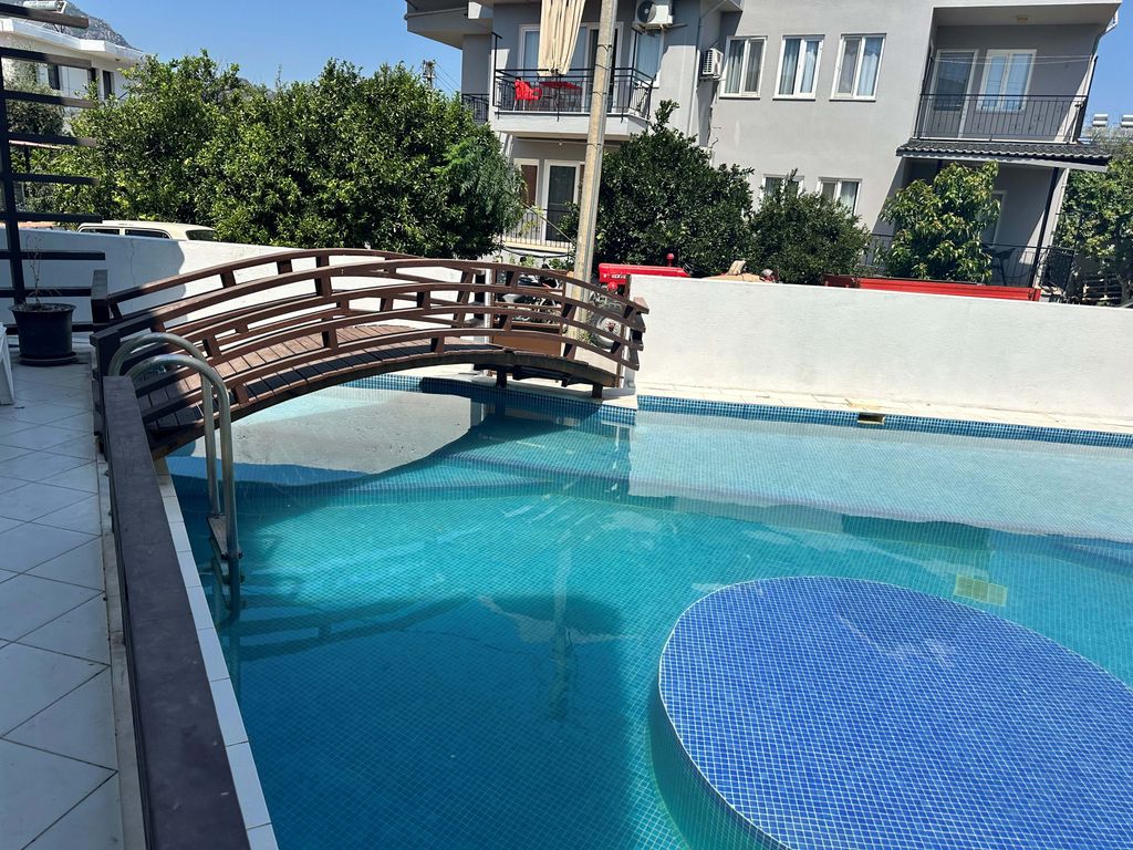 Property photo 3 of 17 Delightful Riverside Apartment For Sale In Dalyan - Delightful Bridge For Apartment Access