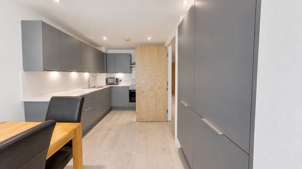 Property photo 3 of 10 Bright Minimalist Gray Kitchen Dining Interior