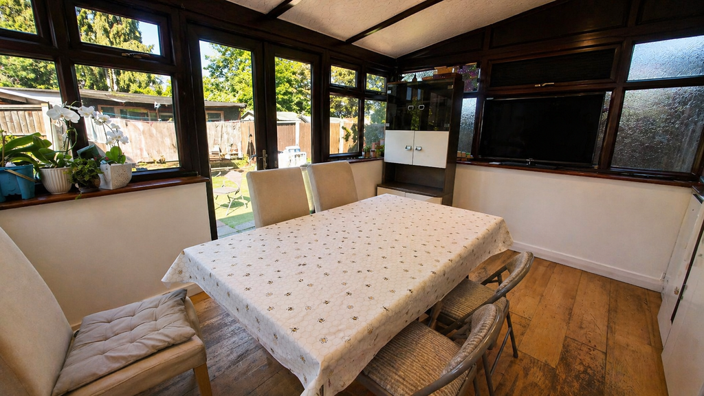 Property photo 3 of 16 Conservatory