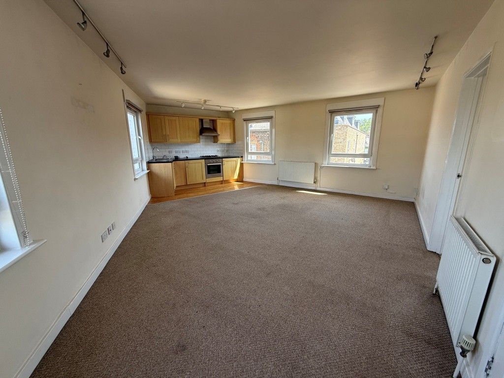 Property photo 2 of 9 Living Area And Kitchen
