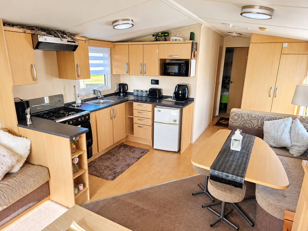 Property photo 3 of 3 Bright Open Plan Kitchen And Dining Area With Fitted Appliances, Wooden Cabinetry And Seating