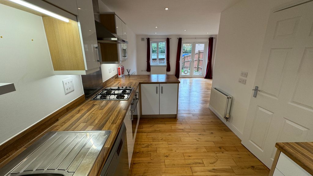 Property photo 3 of 17 Kitchen Area
