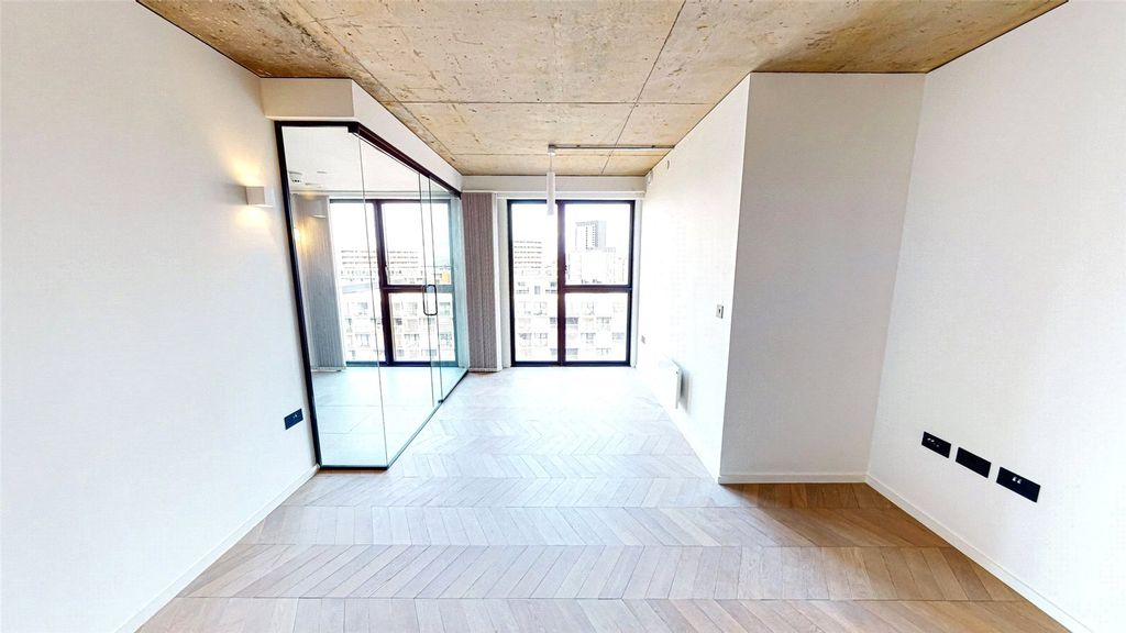 Property photo 3 of 17 Living Area