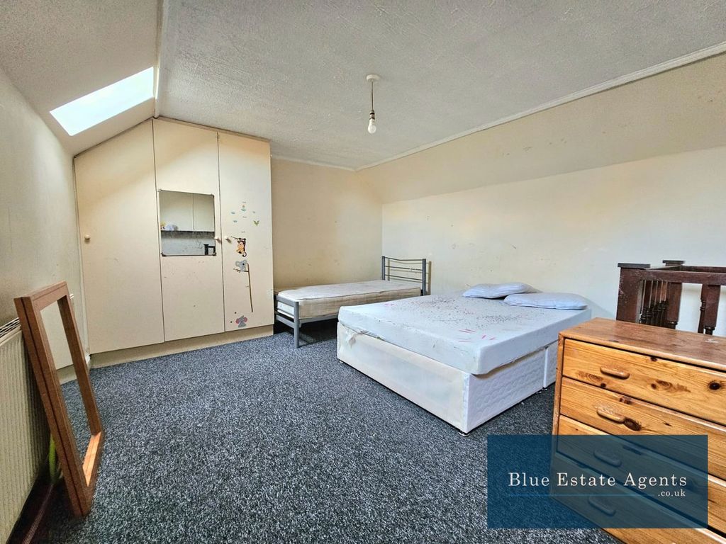 Property photo 3 of 5 Bedroom One