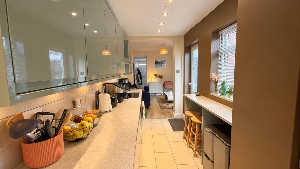 Property photo 3 of 16 Modern Sage Kitchen And Cosy Living Space.Png