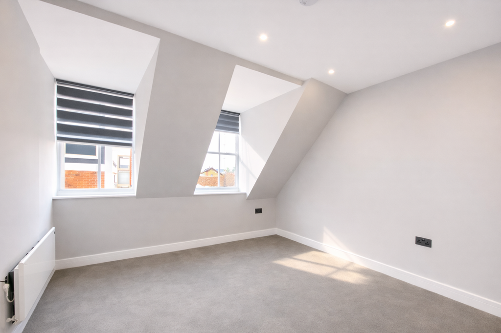Property photo 1 of 4 Modern Bedroom With Sloping Roofline