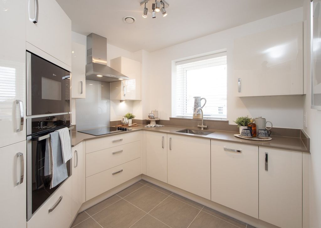 Property photo 2 of 12 Typical Kitchen