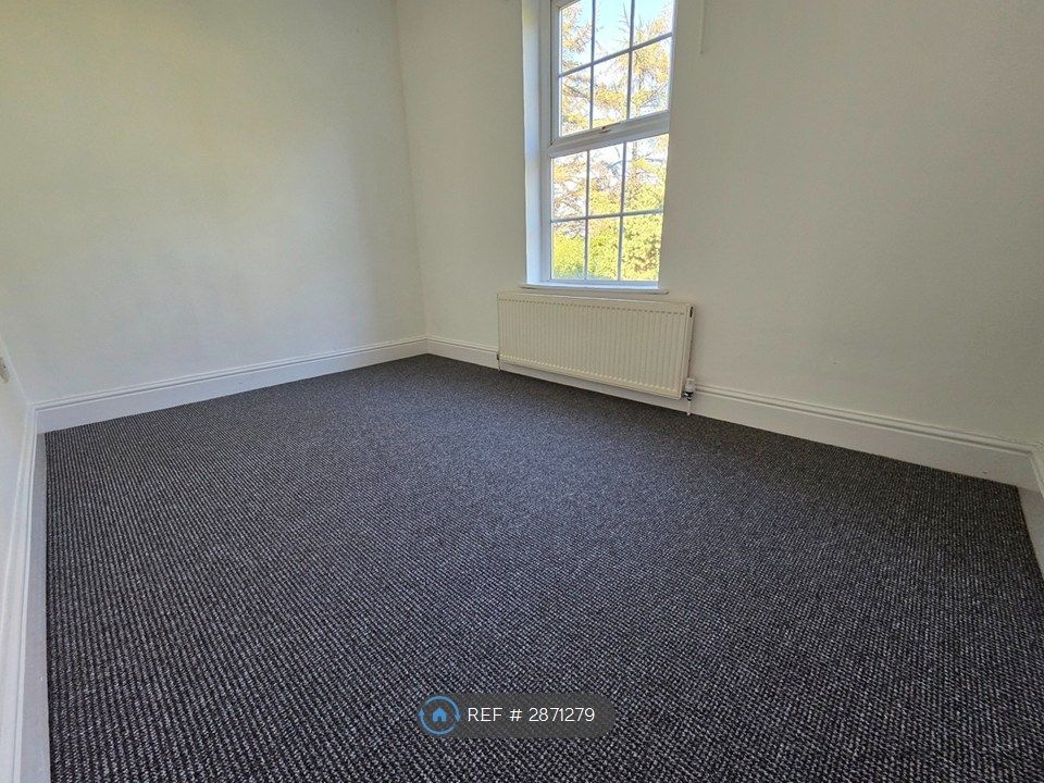 Property photo 3 of 7 Back Bedroom
