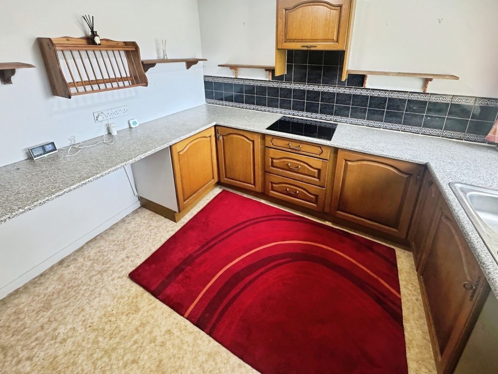 Property photo 2 of 12 Kitchen