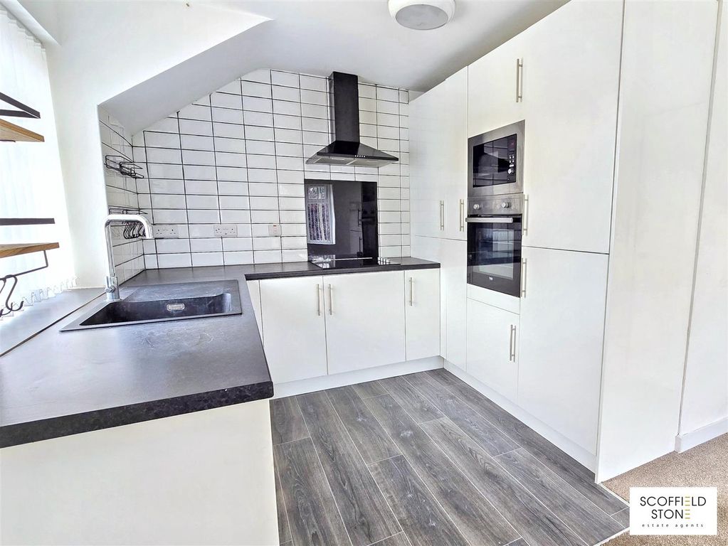 Property photo 3 of 8 Kitchen Area